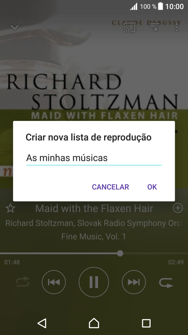 Introduza o nome pretendido para a lista de reprodução e prima OK.