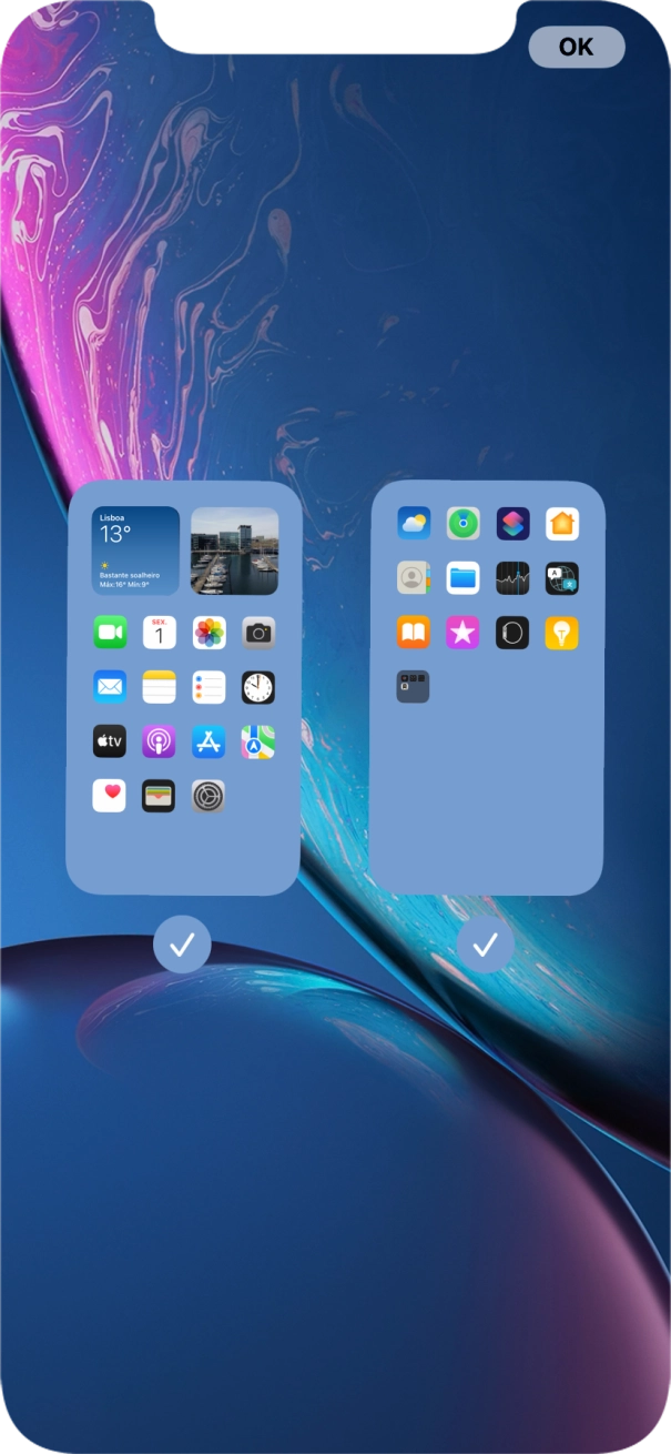 Prima os campos sob as páginas do ecrã inicial pretendidas, para ativar ou desativar a exibição de páginas.