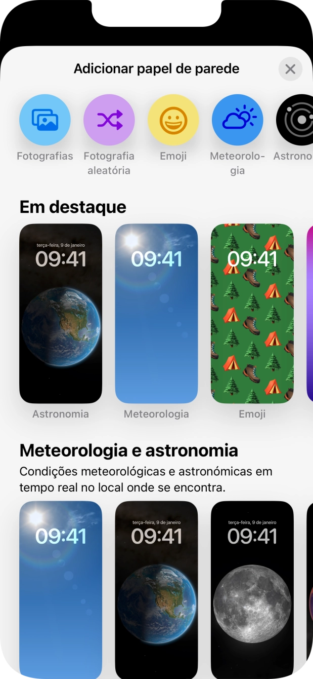 Prima a categoria pretendida e siga as indicações no ecrã para escolher a imagem de fundo pretendida.