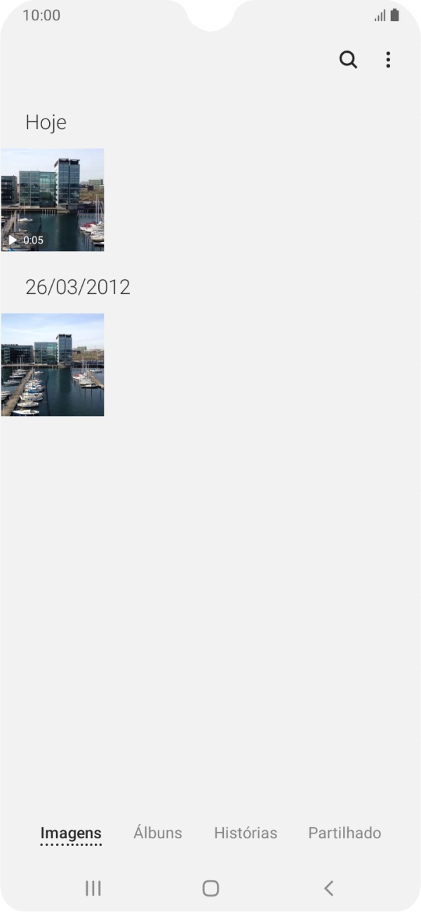 Prima Álbuns e vá até à pasta pretendida.