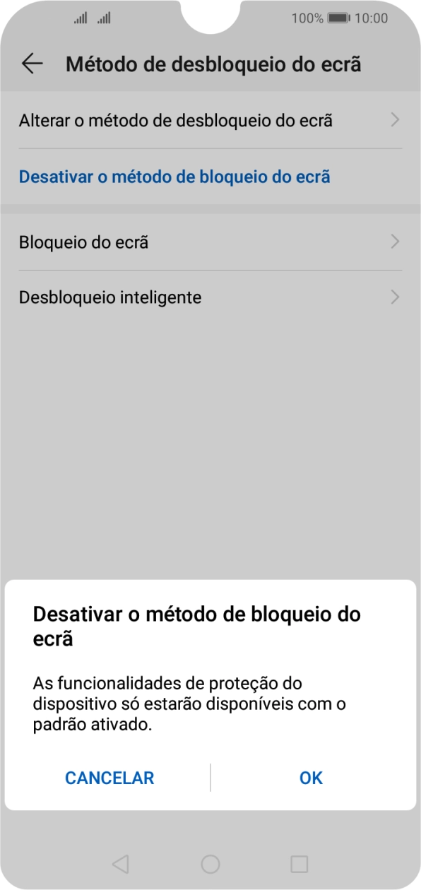 Introduza o código de bloqueio do telefone atual e prima OK.