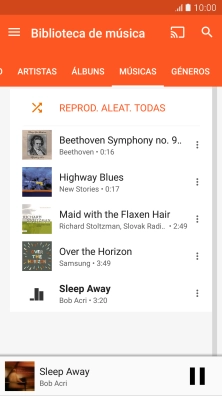 Prima o título da música na parte inferior do ecrã.