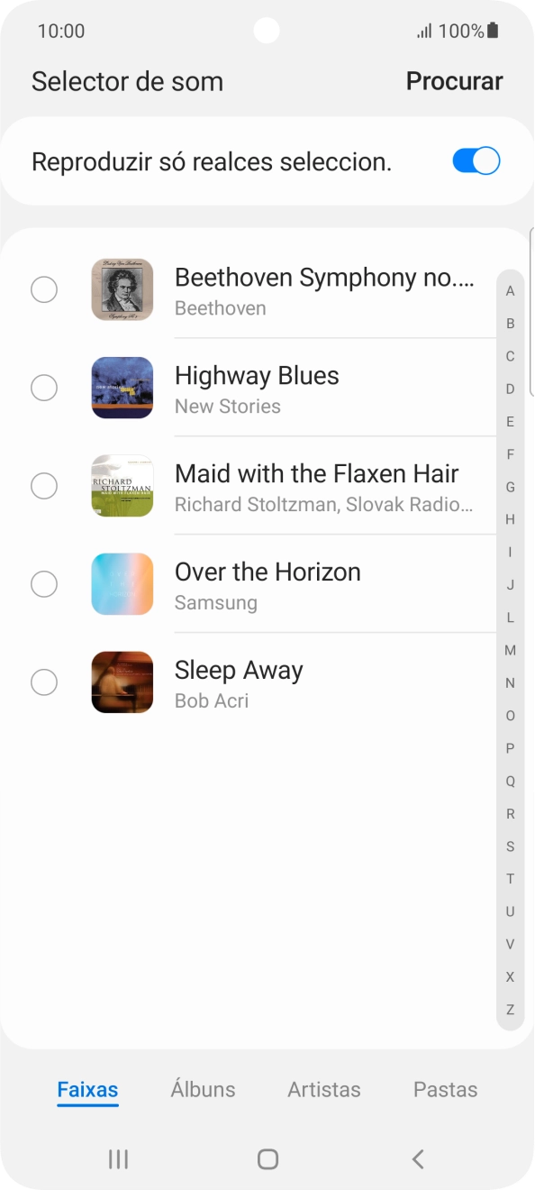 Prima os tons de toque pretendidos para os ouvir.