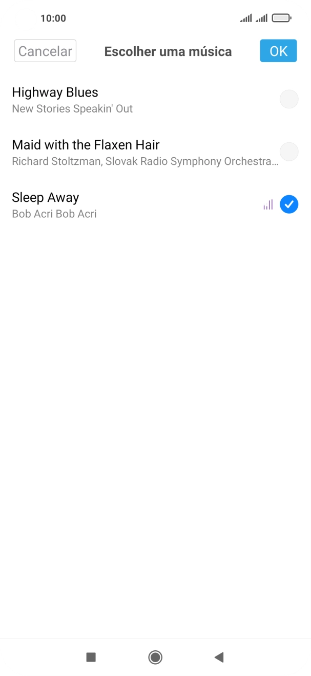 Quando tiver encontrado o tom de toque que pretende, prima OK.