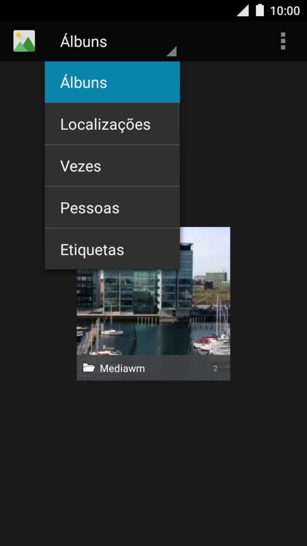 Prima Álbuns e vá até à pasta pretendida.