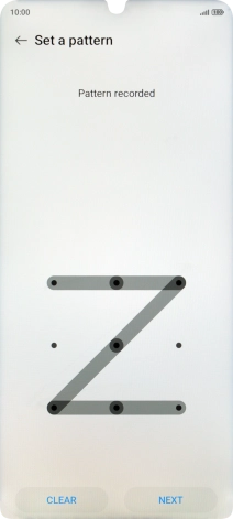 Slide your finger across the screen to connect at least four points and press NEXT.