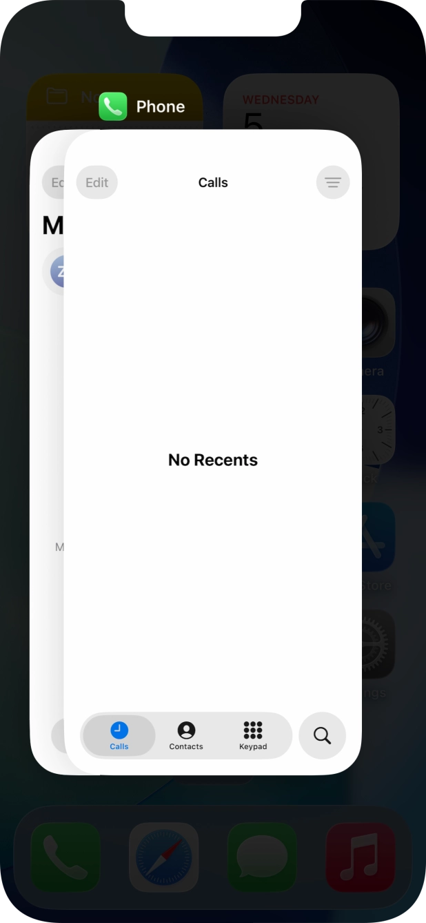Slide upwards on the required application to end it.