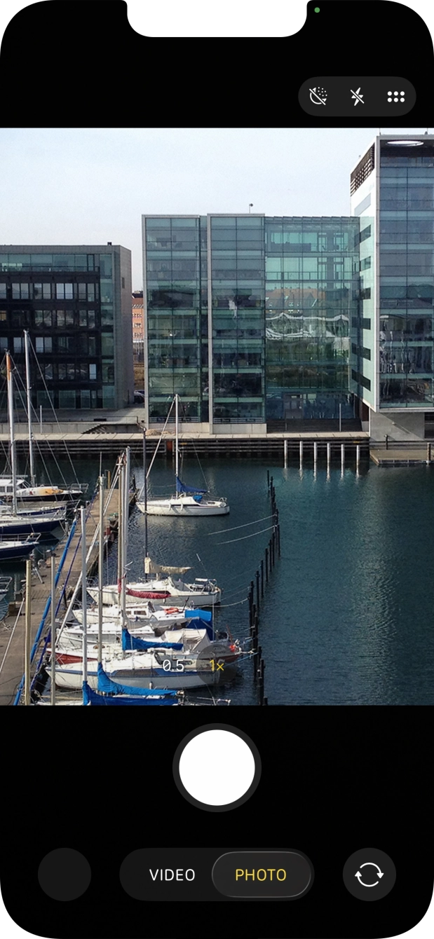 Slide your finger right or left on the screen to select the required camera mode. Slide your finger right or left on the screen to select the required camera mode.