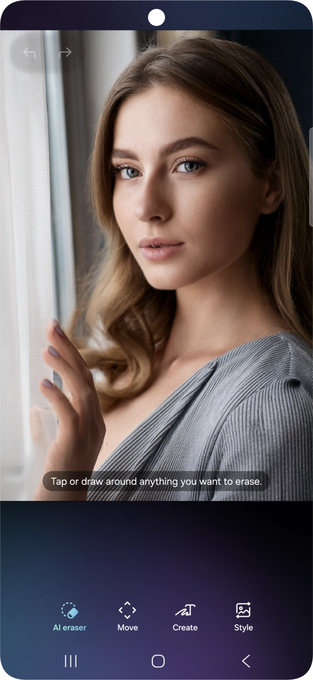 To remove objects from your picture, press AI eraser and follow the instructions on the screen to use the function.