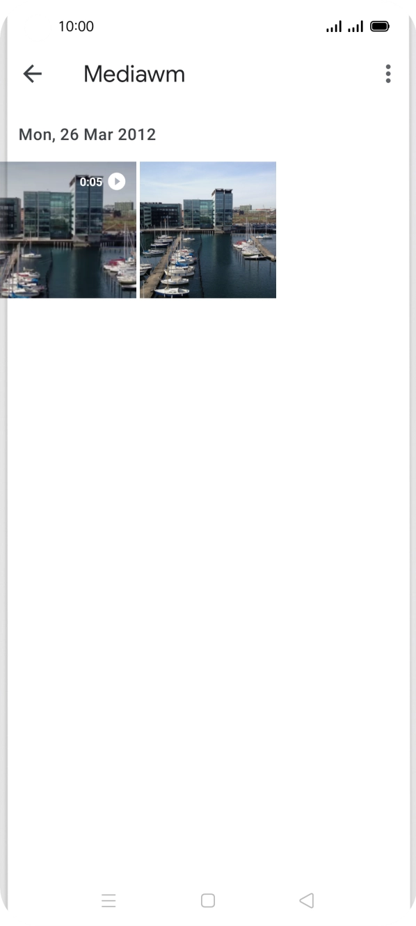 Press and hold any picture or video clip. Press and hold any picture or video clip.