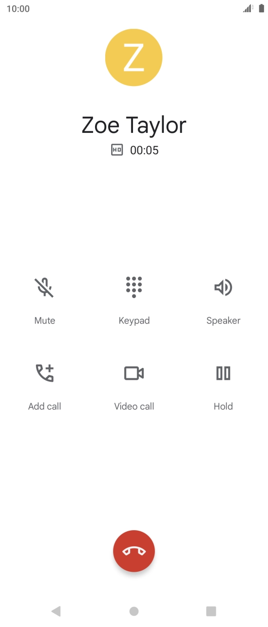 Press the end call icon.