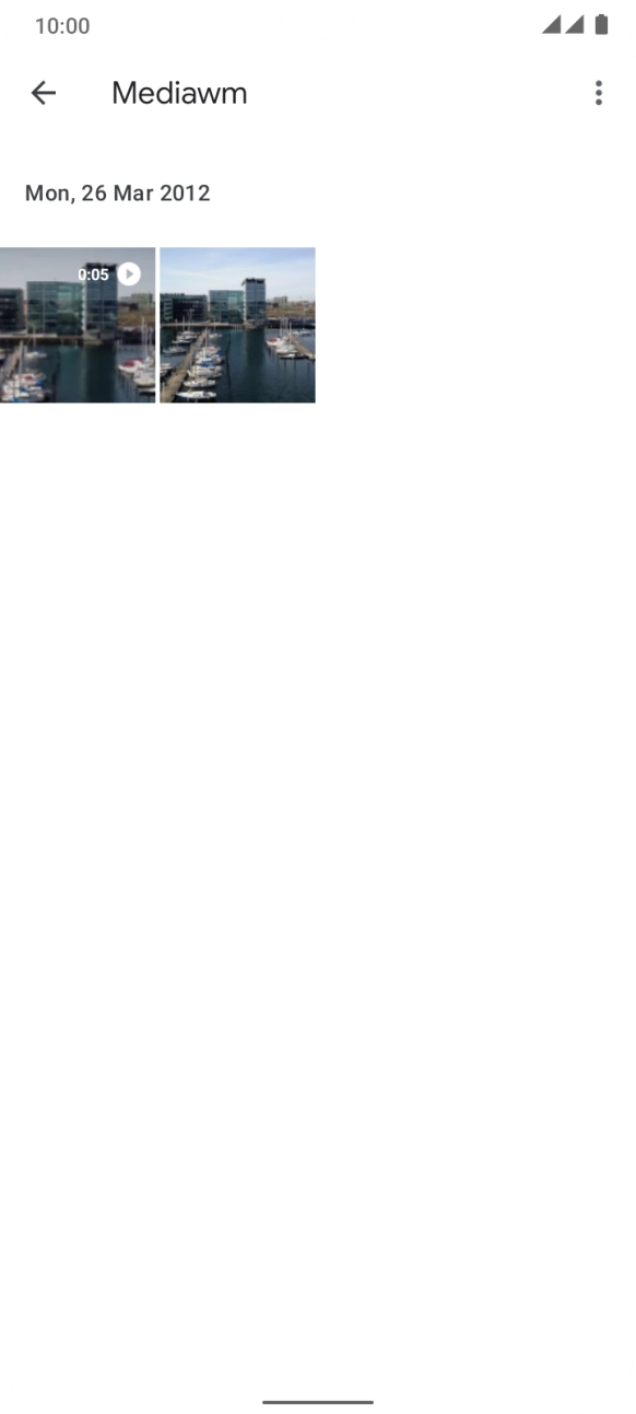 Press and hold the required picture or video clip. Press and hold the required picture or video clip.