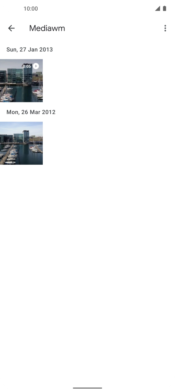 Press and hold the required picture or video clip. Press and hold the required picture or video clip.