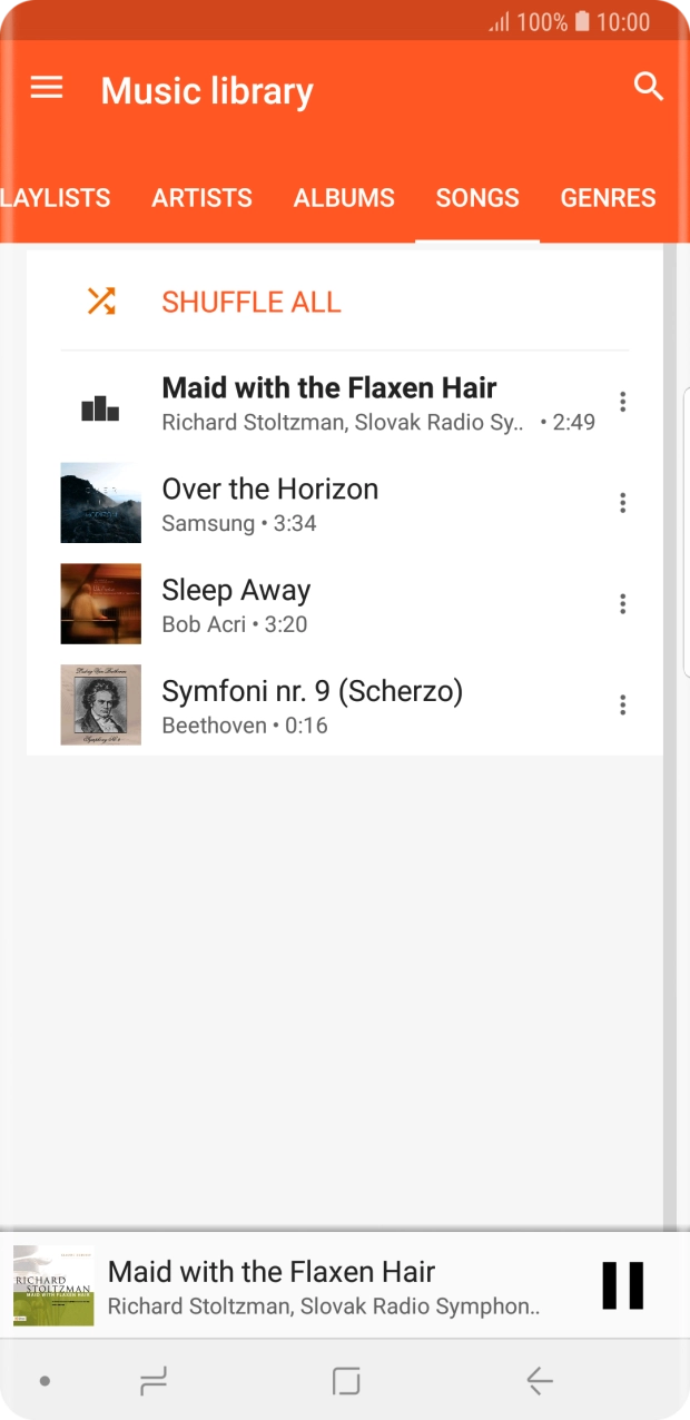 Press the song title at the bottom of the screen.