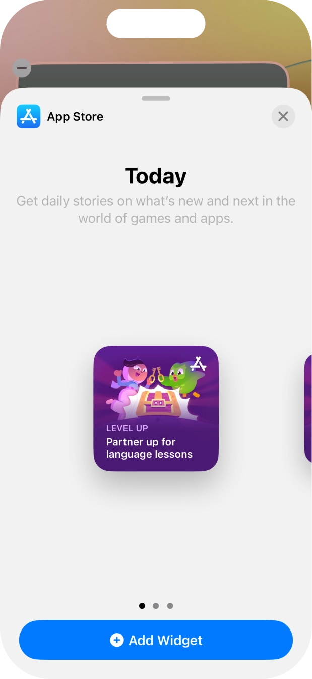 Slide your finger right or left on the screen to select the required widget size.
