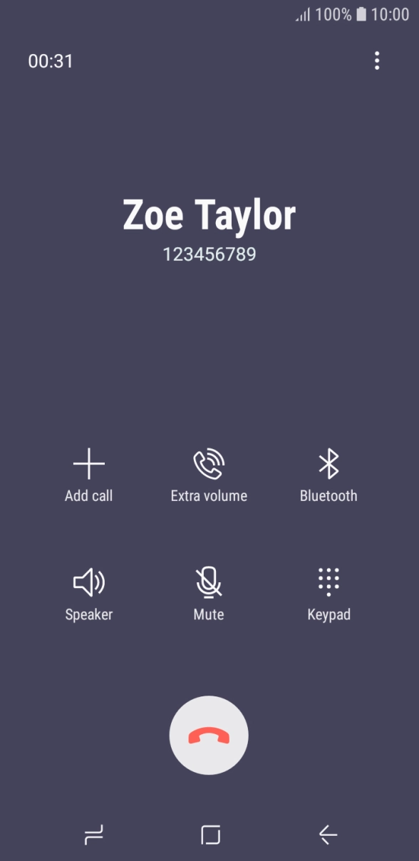Press the end call icon.