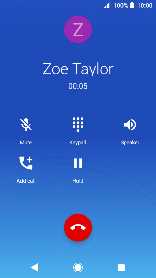 Press the end call icon.