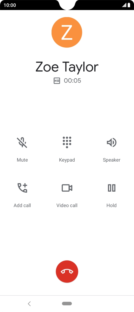 Press the end call icon.