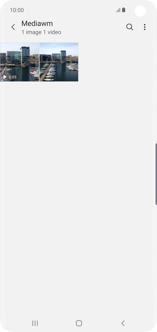 Press and hold any picture or video clip. Press and hold any picture or video clip.