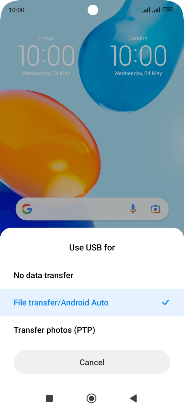 Press File transfer/Android Auto. Press File transfer/Android Auto.