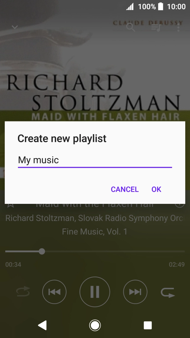 Key in a name for the playlist and press OK.