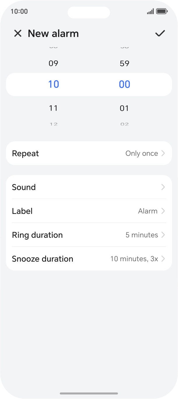 Slide your finger up or down on the hour and minute numbers to set the required alarm time.