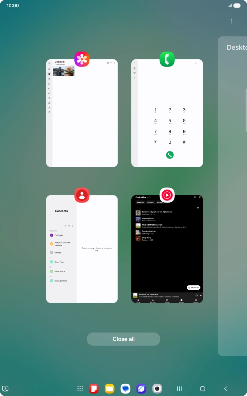 Press the first application and drag it to the top or bottom of the screen. Press the first application and drag it to the top or bottom of the screen.