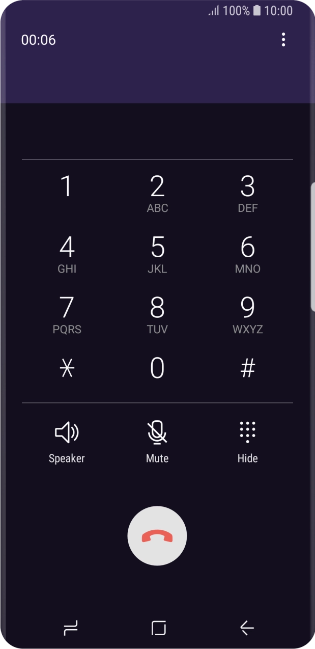 Press the end call icon.