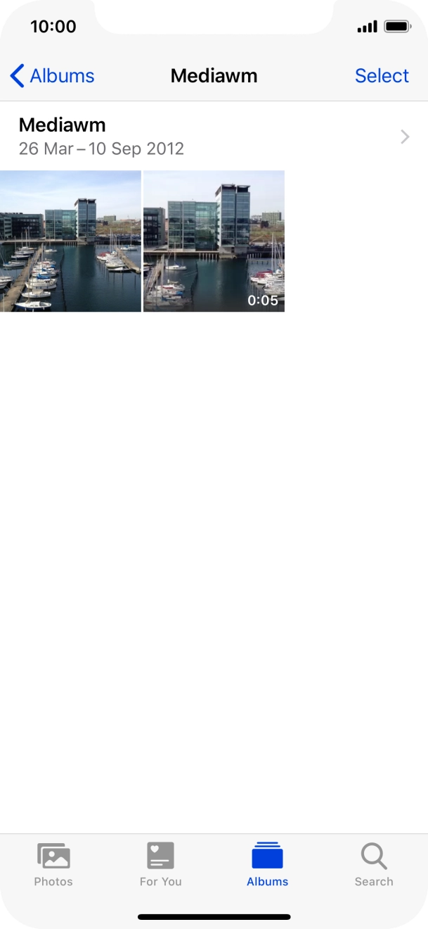 Go to the required folder and press the required picture or video clip.