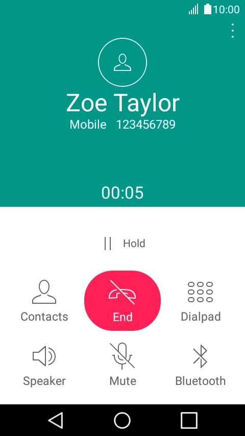 Press the end call icon.