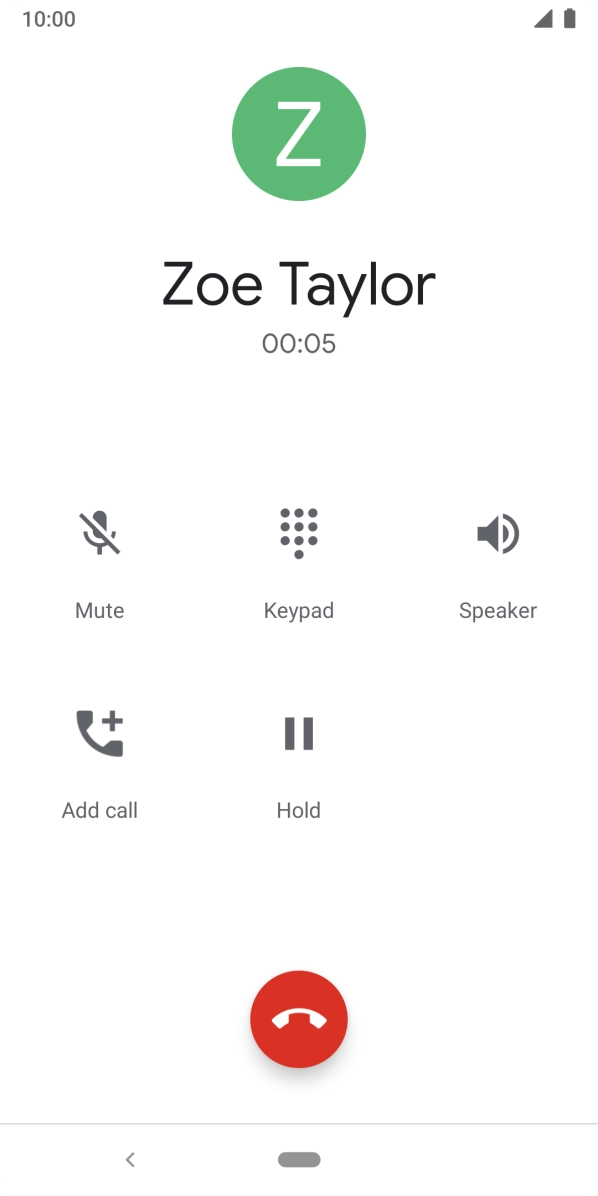 Press the end call icon.