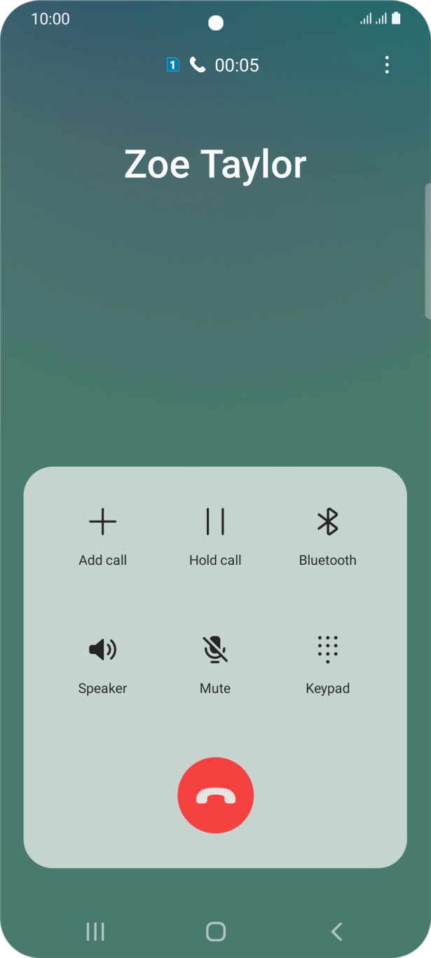 Press the end call icon.