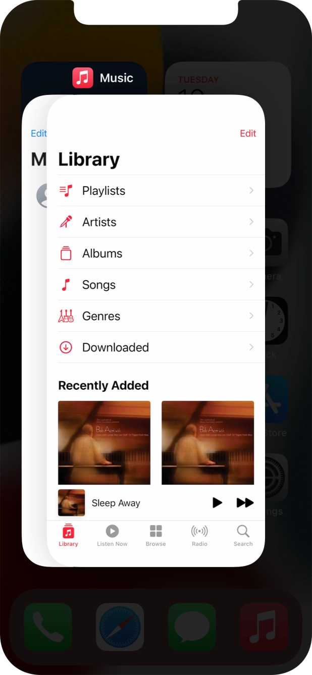 Slide upwards on the required application to end it.