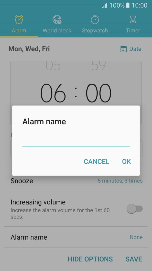 Key in a name for the alarm and press OK.