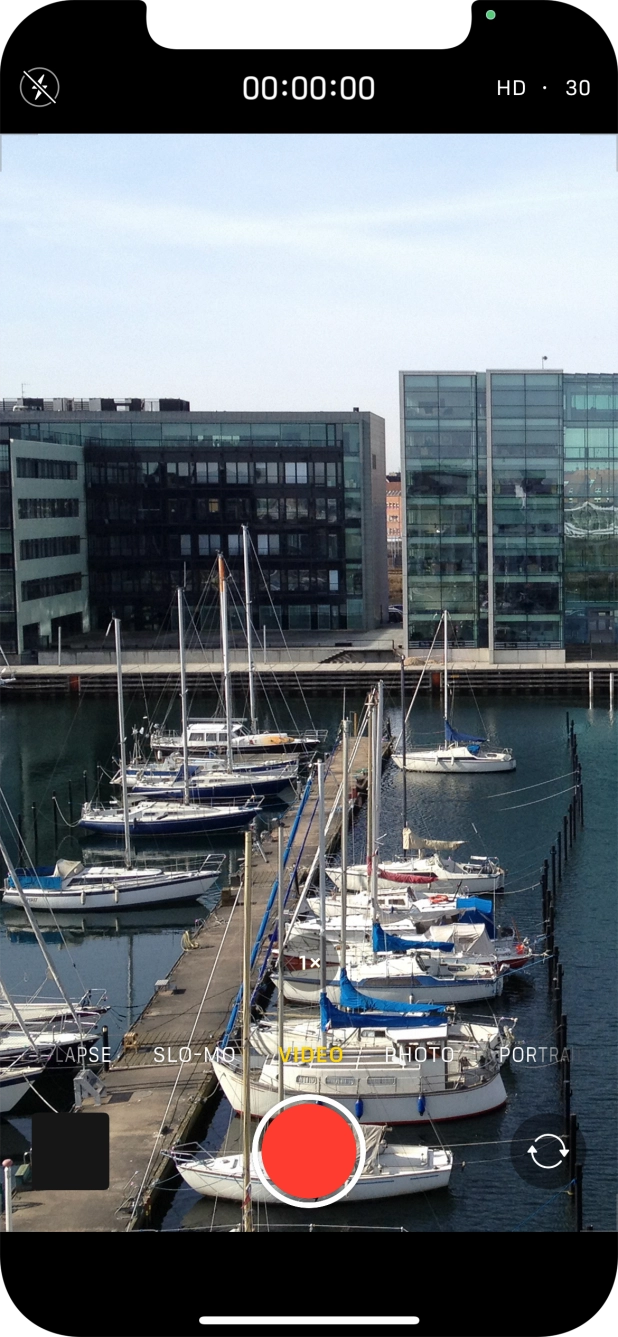 Slide your finger right or left on the screen to select PHOTO.