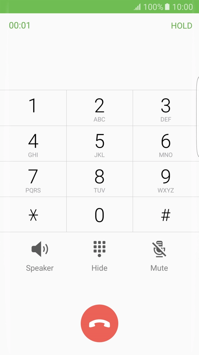 Press the end call icon.