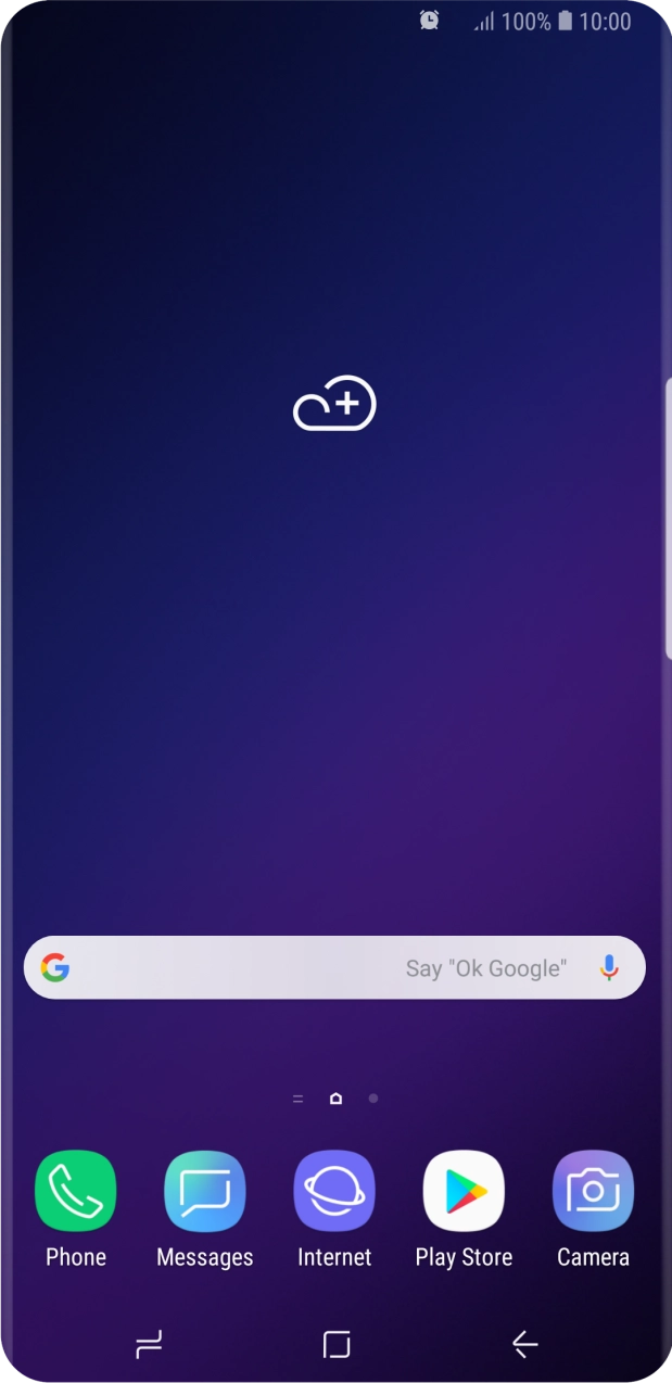 The alarm icon shows that the alarm is set.
