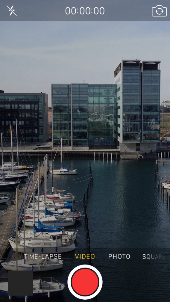 Slide your finger right or left on the screen to select PHOTO.