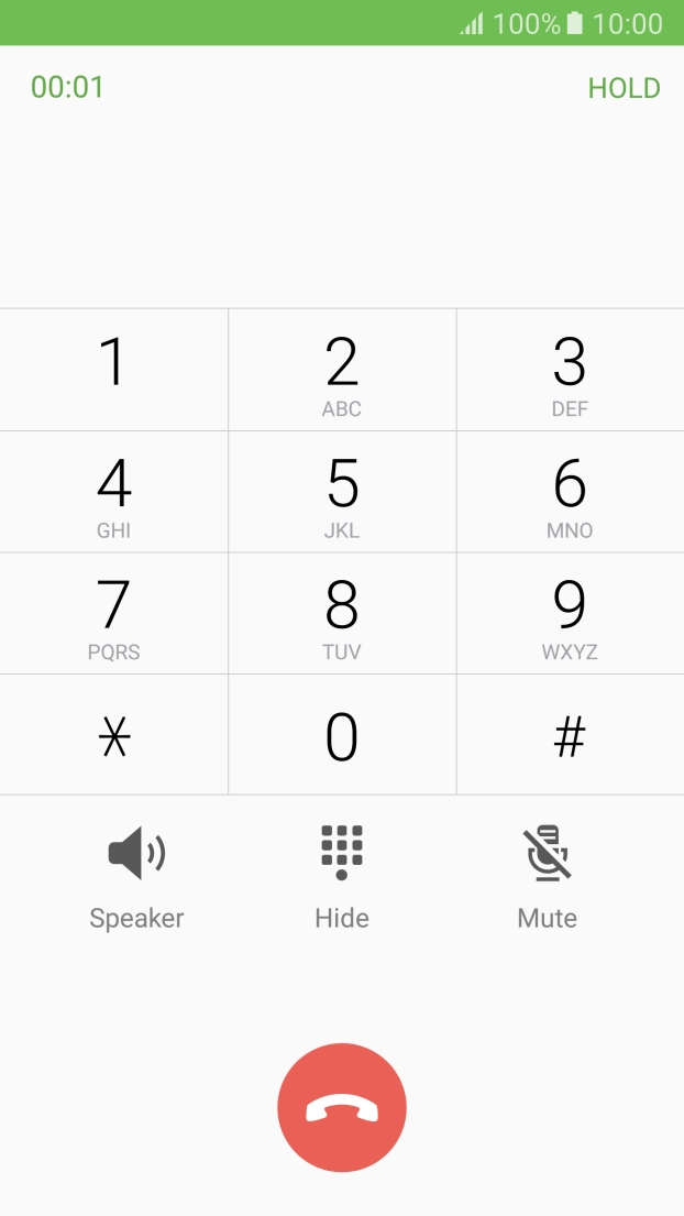 Press the end call icon.