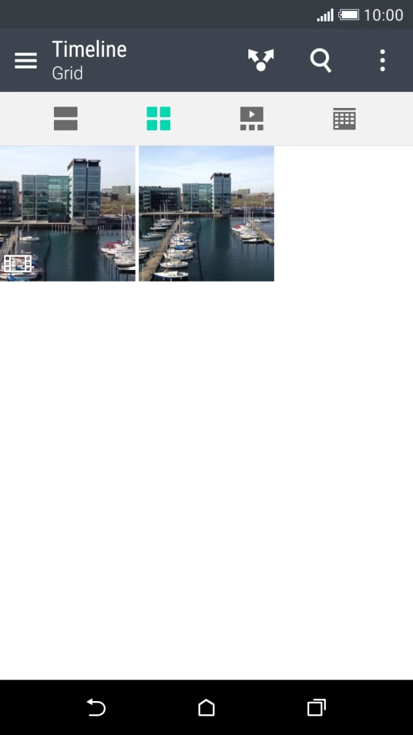 Slide your finger right starting from the left side of the screen.