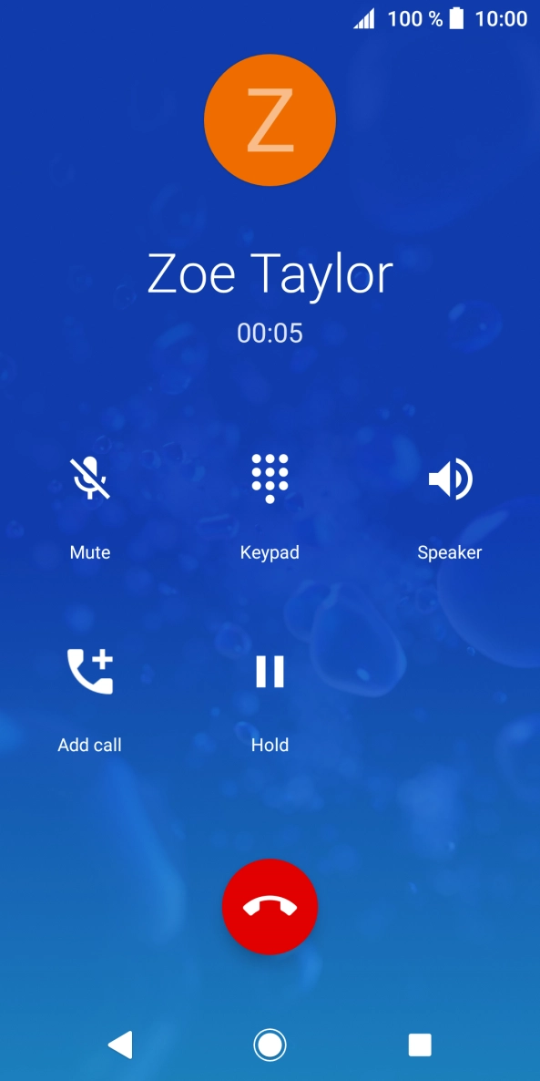 Press the end call icon.