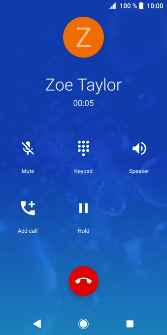 Press the end call icon.