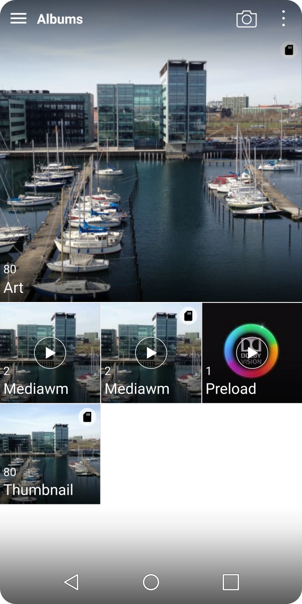 Slide your finger right starting from the left side of the screen.