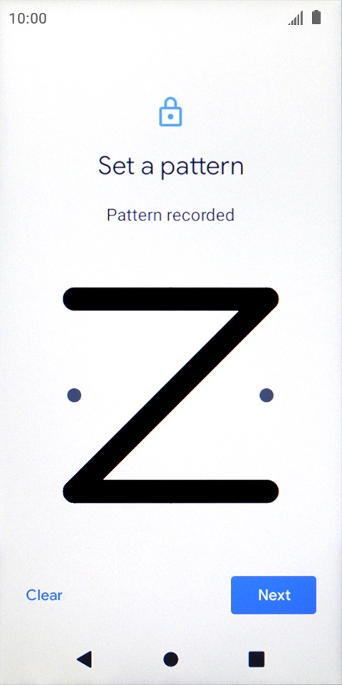 Slide your finger across the screen to connect at least four points and press Next.