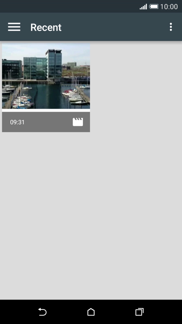 Slide your finger right starting from the left side of the screen.