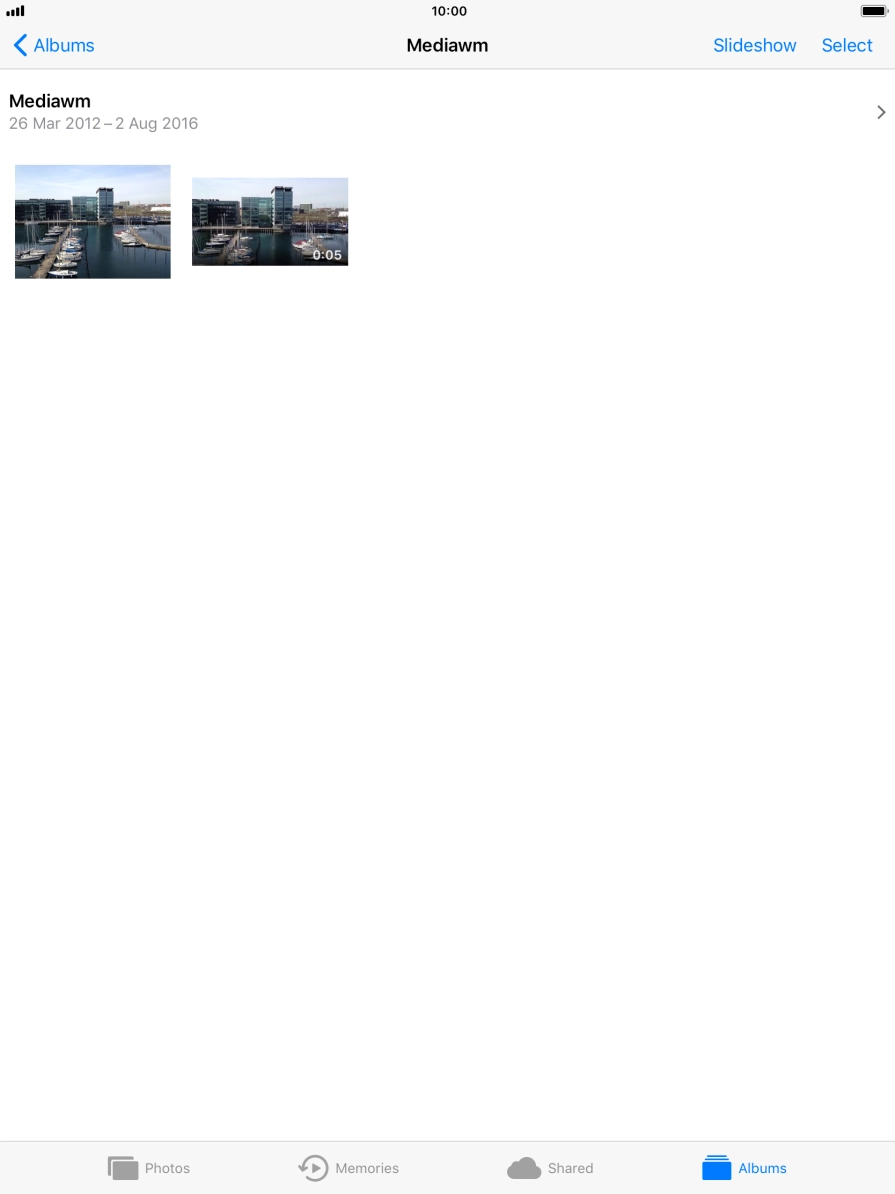 Go to the required folder and press the required picture or video clip.