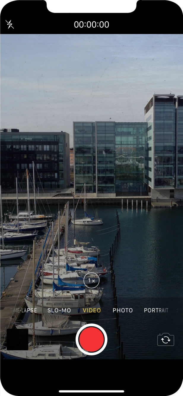 Slide your finger right or left on the screen to select PHOTO.