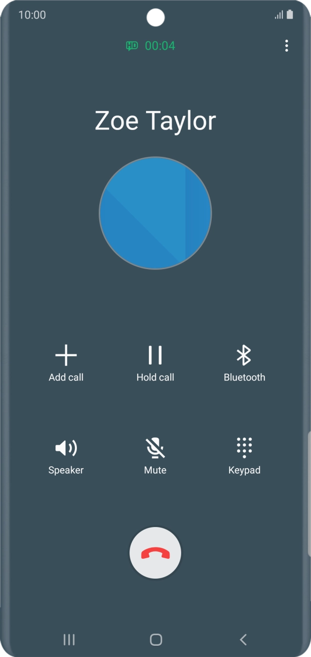 Press the end call icon.