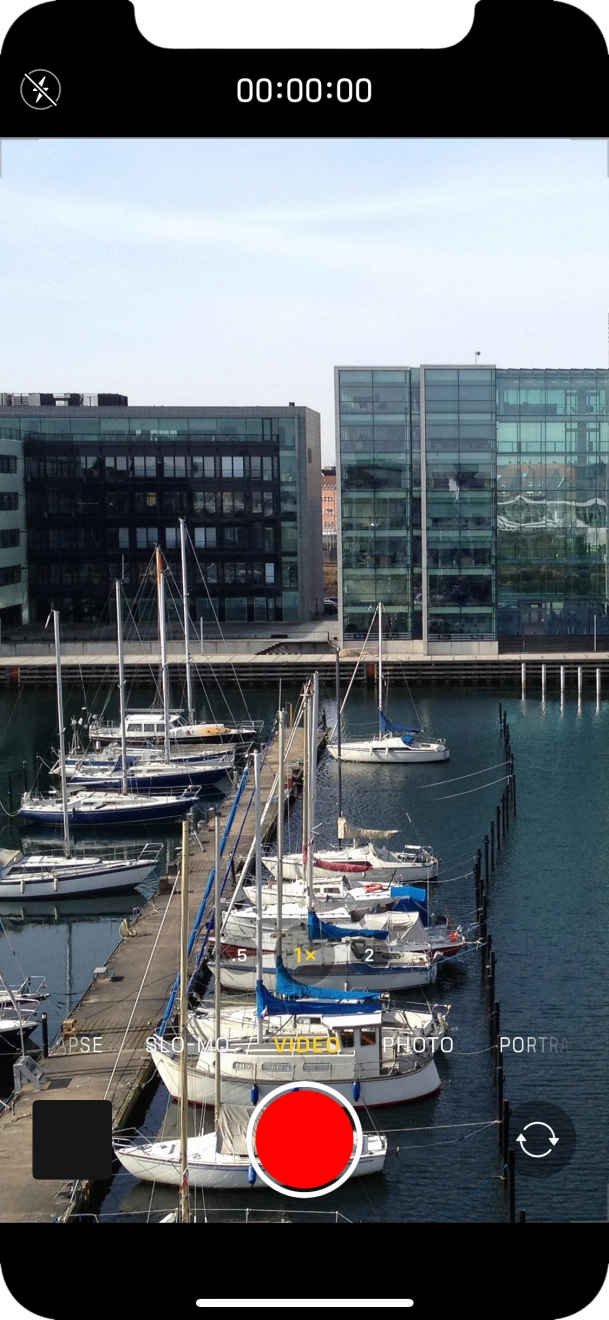 Slide your finger right or left on the screen to select PHOTO.