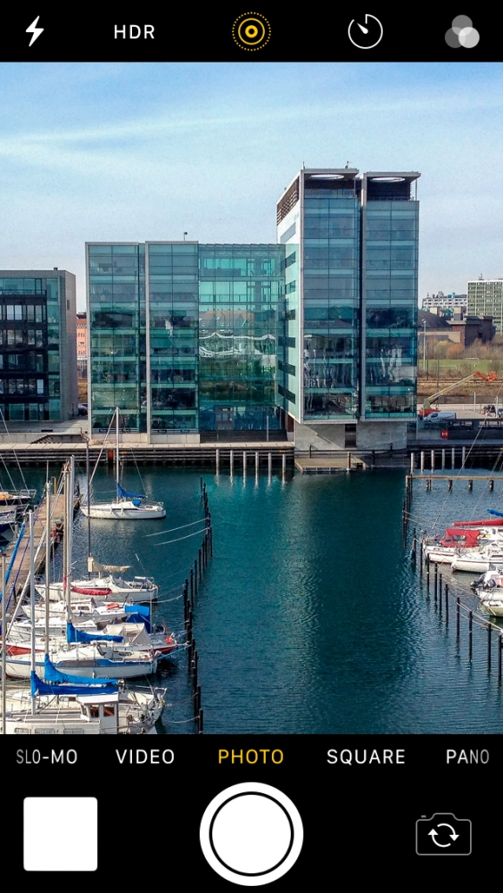 Slide your finger right or left on the screen to select PHOTO.